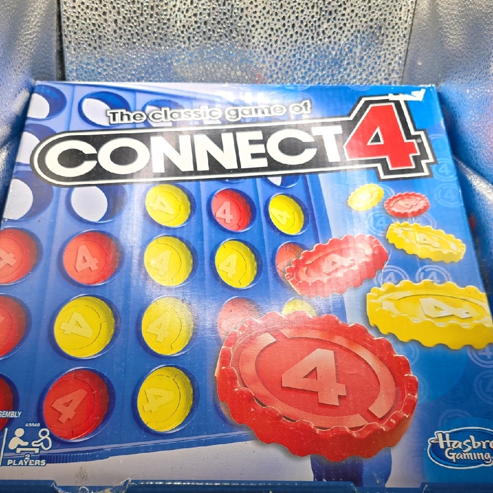 Hasbro Connect 4 Game with Blue, Red, and Yellow